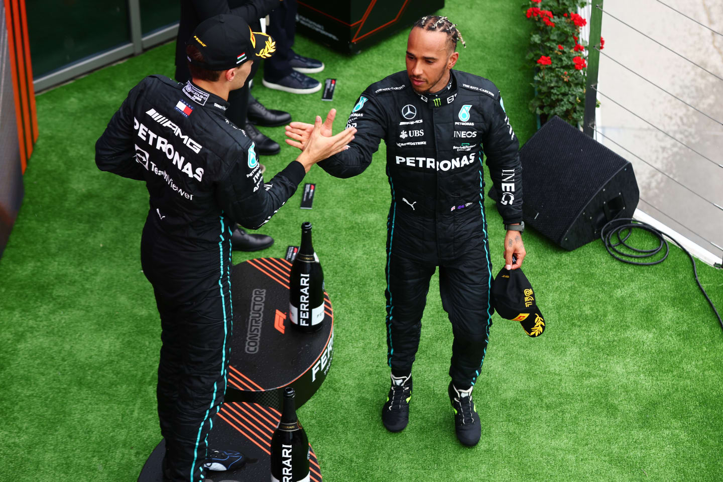 BUDAPEST, HUNGARY - JULY 31: Second placed Lewis Hamilton of Great Britain and Mercedes and Third