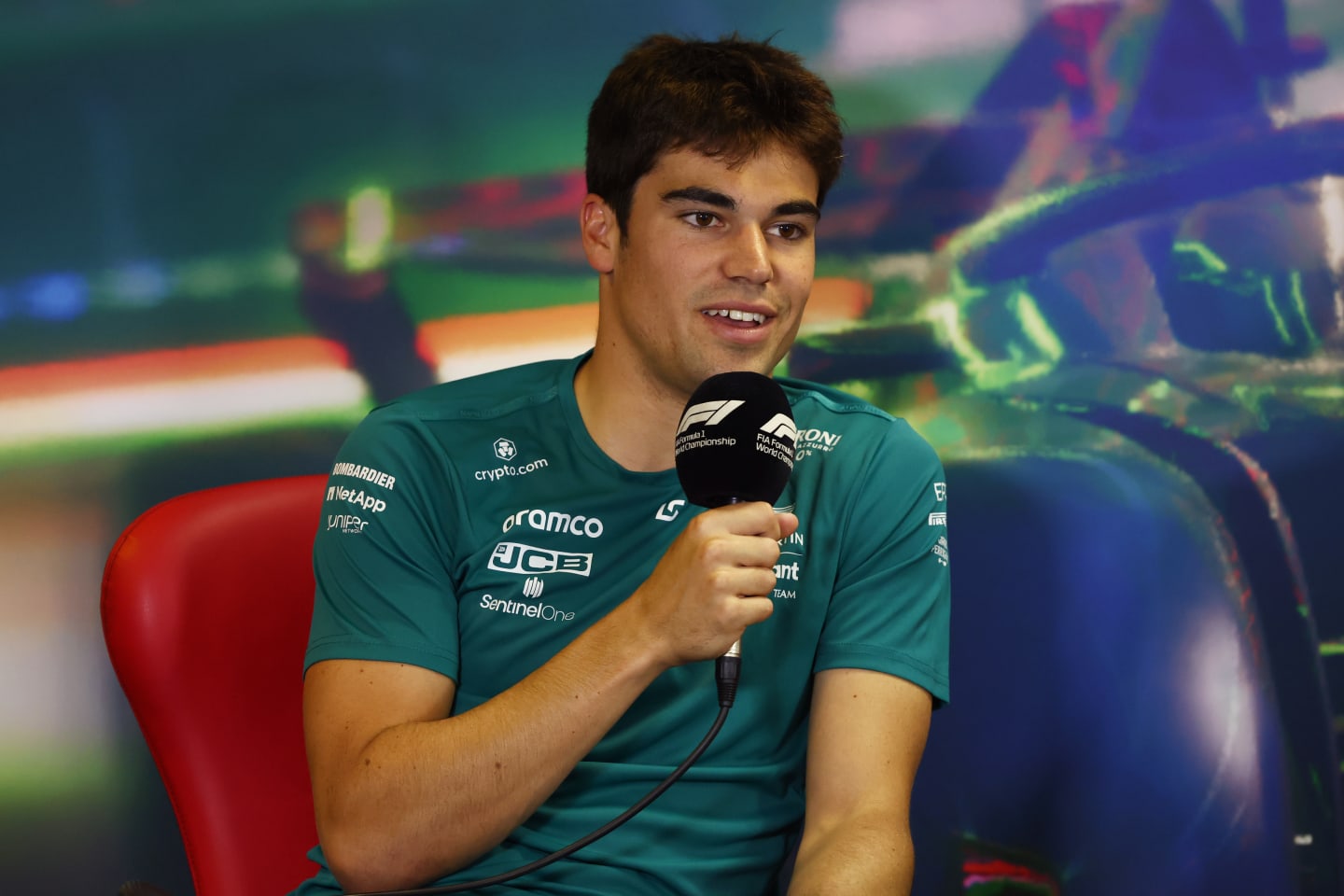 BUDAPEST, HUNGARY - JULY 28: Lance Stroll of Canada and Aston Martin F1 Team talks in the Drivers Press Conference during previews ahead of the F1 Grand Prix of Hungary at Hungaroring on July 28, 2022 in Budapest, Hungary. (Photo by Bryn Lennon/Getty Images)