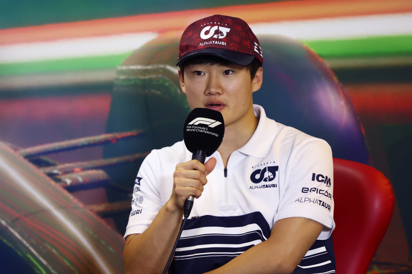 BUDAPEST, HUNGARY - JULY 28: Yuki Tsunoda of Japan and Scuderia AlphaTauri talks in the Drivers Press Conference during previews ahead of the F1 Grand Prix of Hungary at Hungaroring on July 28, 2022 in Budapest, Hungary. (Photo by Bryn Lennon/Getty Images)