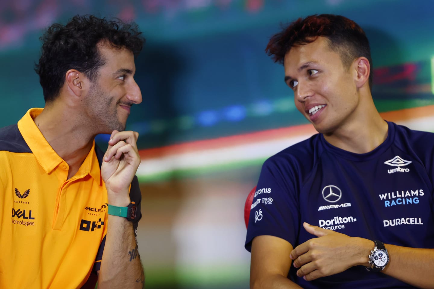 BUDAPEST, HUNGARY - JULY 28: Daniel Ricciardo of Australia and McLaren and Alexander Albon of Thailand and Williams talk in the Drivers Press Conference during previews ahead of the F1 Grand Prix of Hungary at Hungaroring on July 28, 2022 in Budapest, Hungary. (Photo by Bryn Lennon/Getty Images)