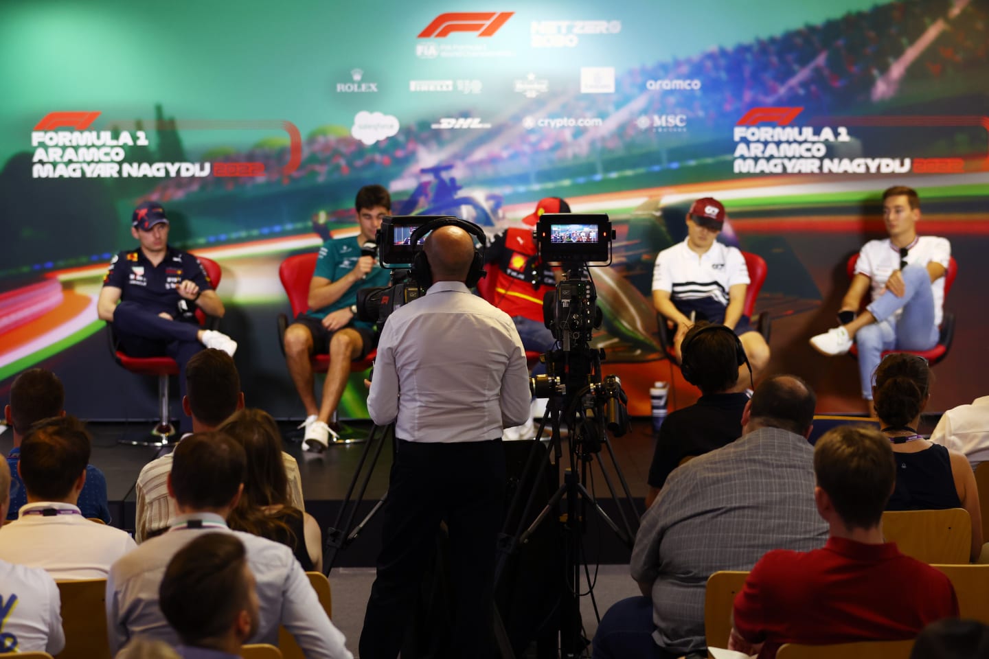 BUDAPEST, HUNGARY - JULY 28: A view of the camera operator in the Drivers Press Conference during previews ahead of the F1 Grand Prix of Hungary at Hungaroring on July 28, 2022 in Budapest, Hungary. (Photo by Bryn Lennon/Getty Images)
