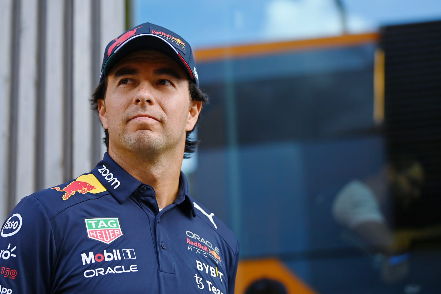 MONZA, ITALY - SEPTEMBER 08: Sergio Perez of Mexico and Oracle Red Bull Racing walks in the Paddock