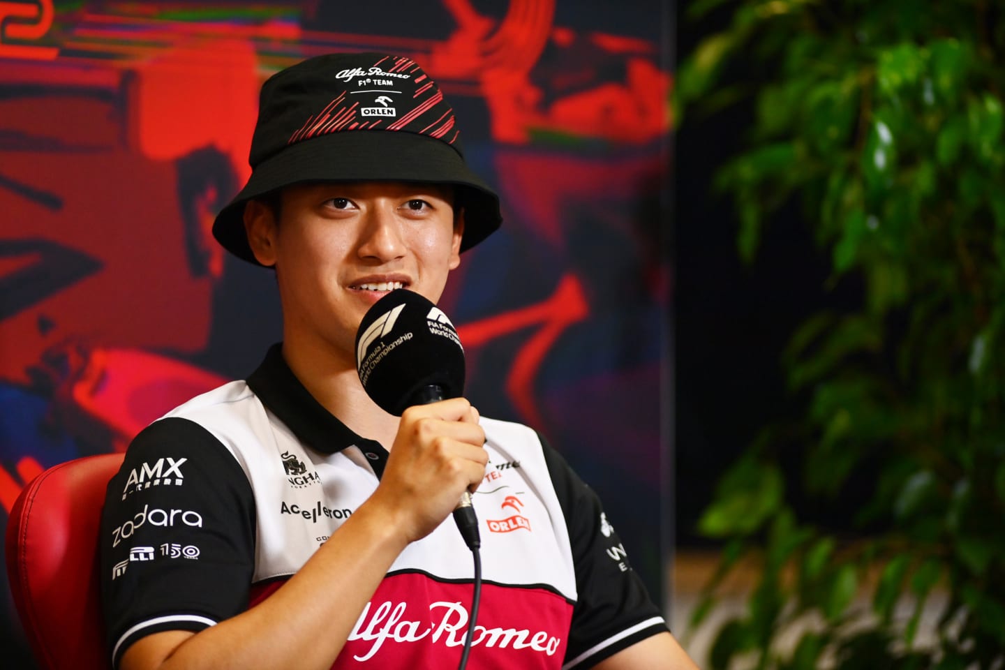 MONZA, ITALY - SEPTEMBER 08: Zhou Guanyu of China and Alfa Romeo F1 talks to the media in the
