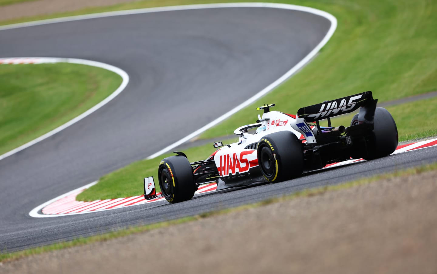 SUZUKA, JAPAN - OCTOBER 08: Mick Schumacher of Germany driving the (47) Haas F1 VF-22 Ferrari on