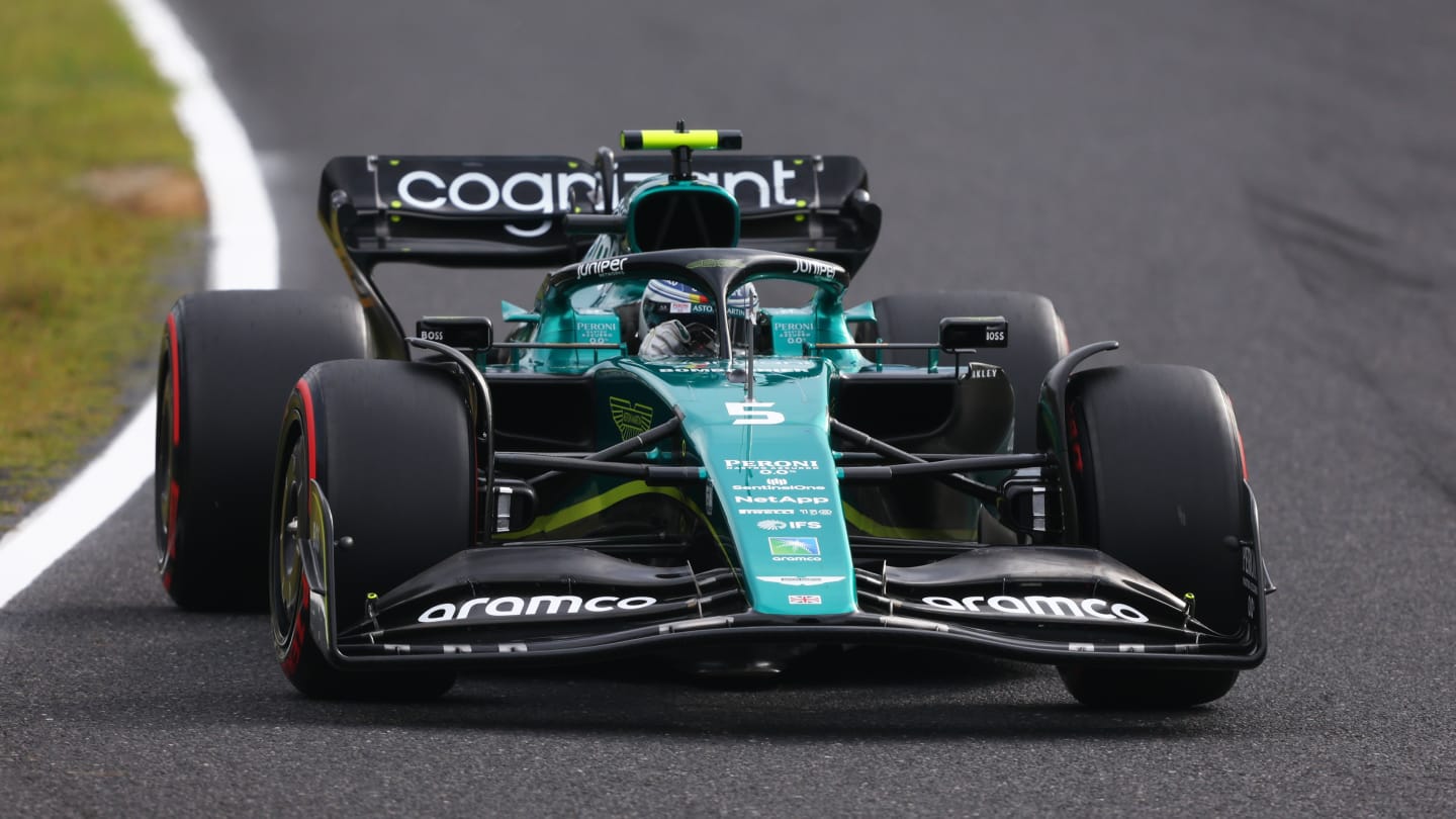 SUZUKA, JAPAN - OCTOBER 08: Sebastian Vettel of Germany driving the (5) Aston Martin AMR22 Mercedes