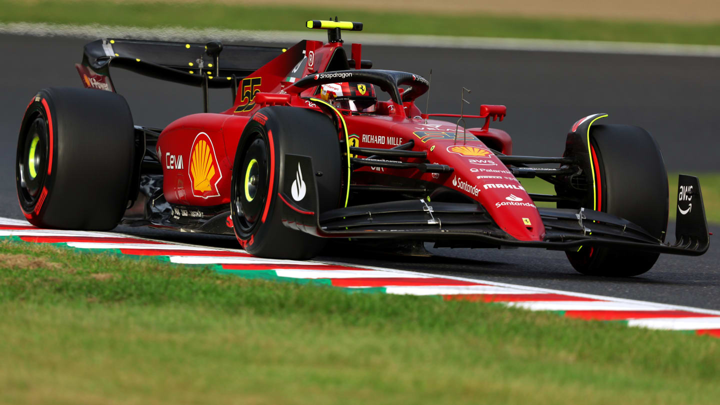 SUZUKA, JAPAN - OCTOBER 08: Carlos Sainz of Spain driving (55) the Ferrari F1-75 on track during qualifying ahead of the F1 Grand Prix of Japan at Suzuka International Racing Course on October 08, 2022 in Suzuka, Japan. (Photo by Bryn Lennon - Formula 1/Formula 1 via Getty Images)