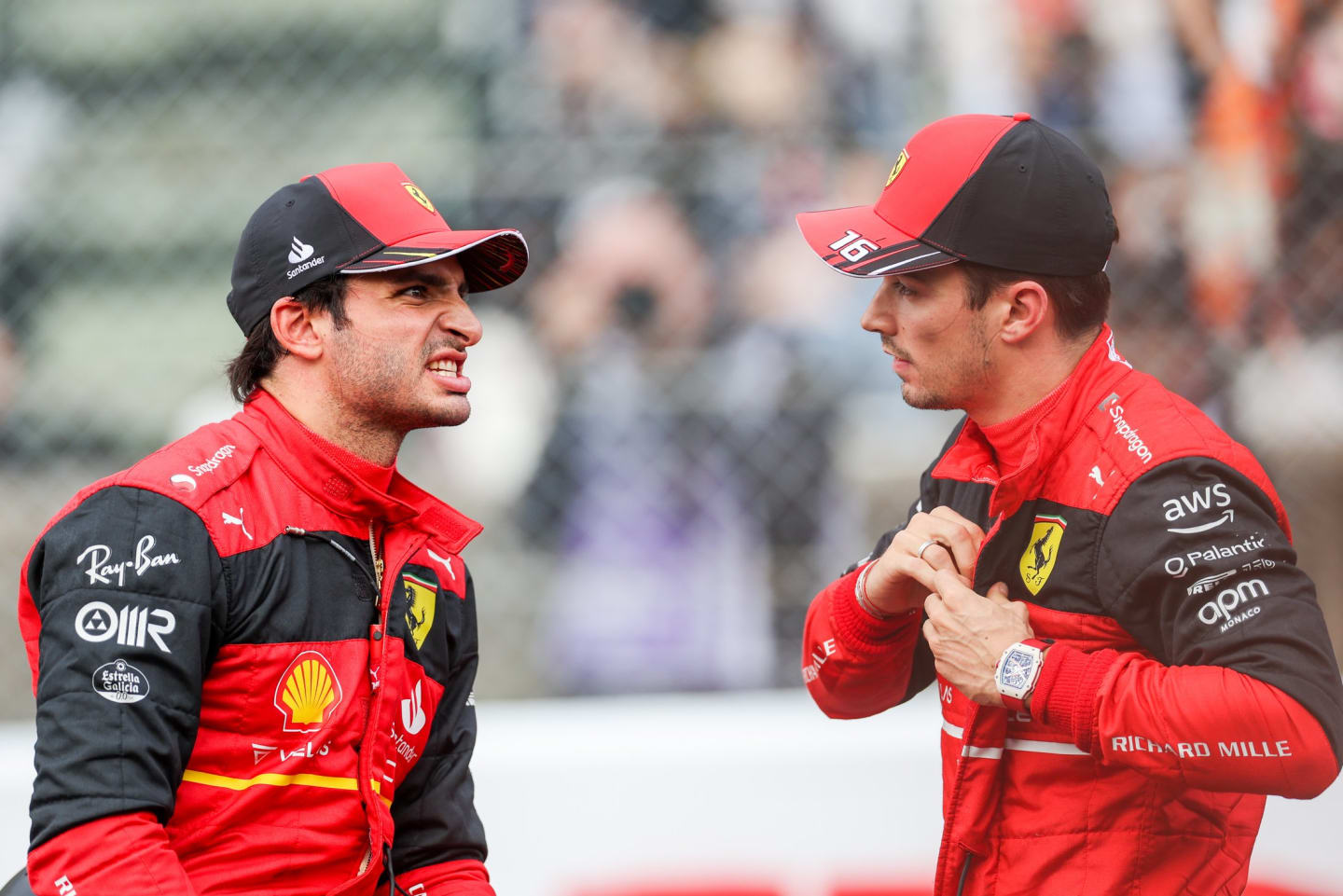 SUZUKA, JAPAN - OCTOBER 08: Carlos Sainz of Ferrari and Spain chats with Charles Leclerc of Ferrari and Monaco during qualifying ahead of the F1 Grand Prix of Japan at Suzuka International Racing Course on October 08, 2022 in Suzuka, Japan. (Photo by Peter Fox/Getty Images )