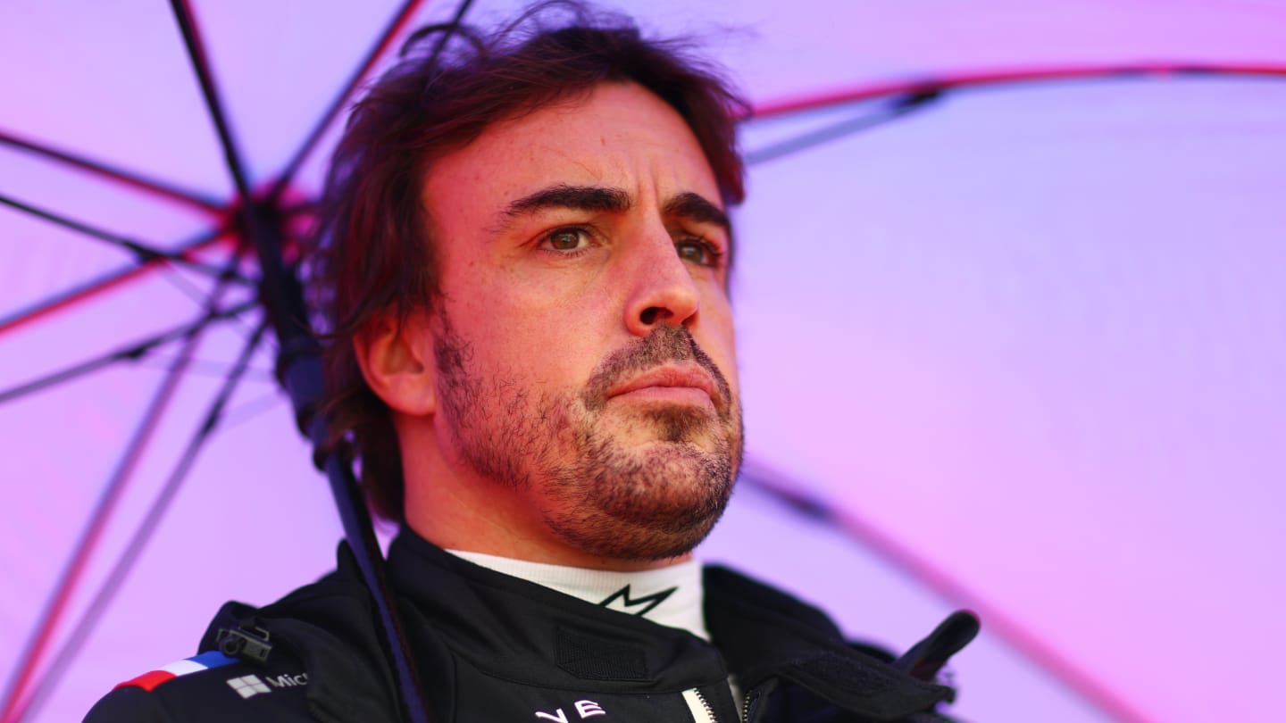 SUZUKA, JAPAN - OCTOBER 09: Fernando Alonso of Spain and Alpine F1 looks on from the grid during