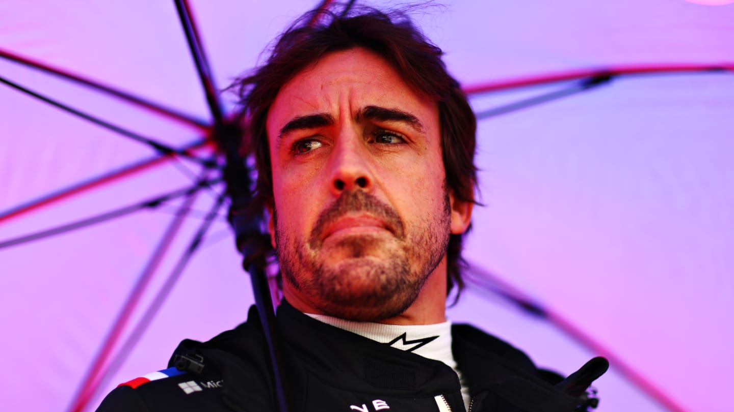 SUZUKA, JAPAN - OCTOBER 09: Fernando Alonso of Spain and Alpine F1 looks on from the grid during the F1 Grand Prix of Japan at Suzuka International Racing Course on October 09, 2022 in Suzuka, Japan. (Photo by Dan Istitene - Formula 1/Formula 1 via Getty Images)