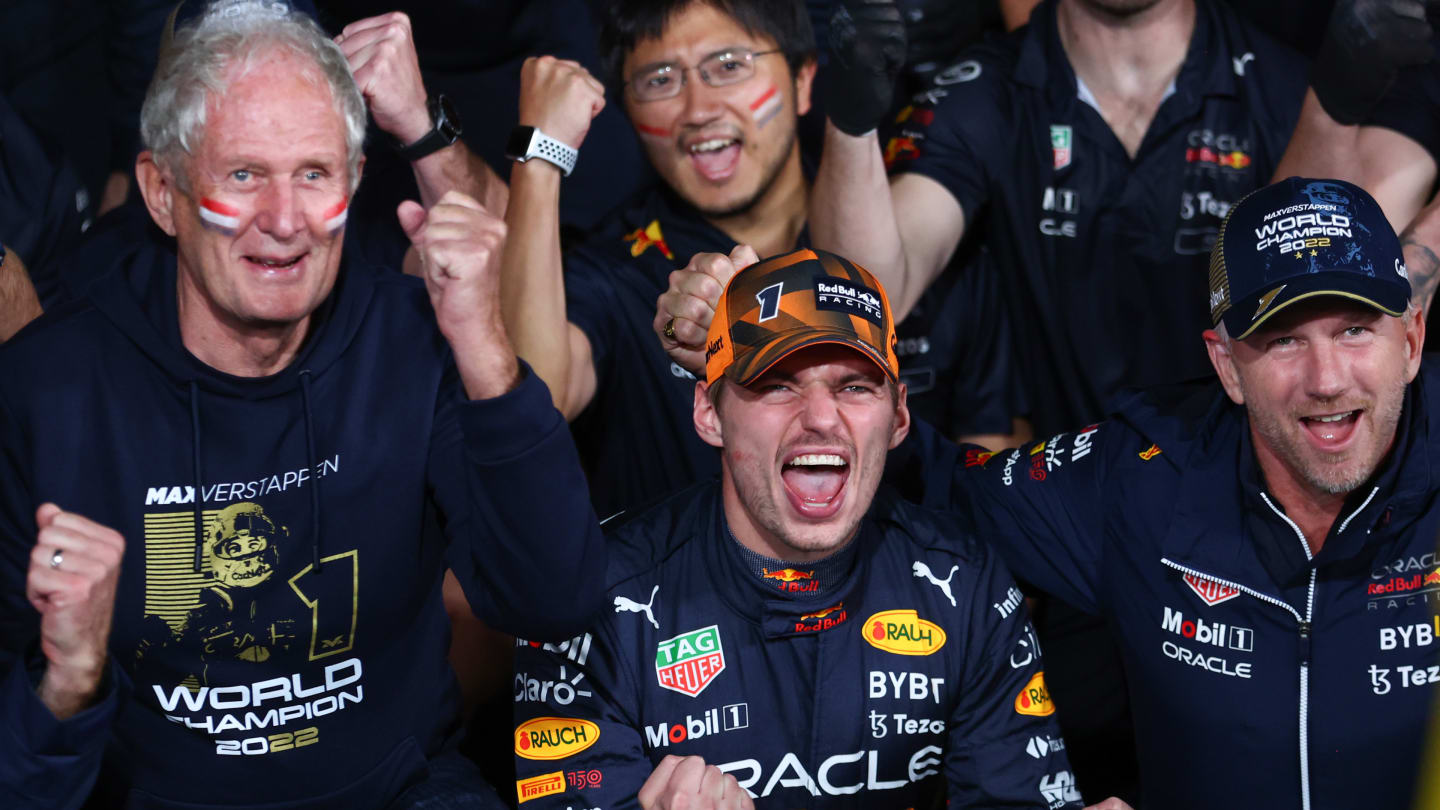 SUZUKA, JAPAN - OCTOBER 09: Race winner and 2022 F1 World Drivers Champion Max Verstappen of Netherlands and Oracle Red Bull Racing celebrates with his team after the F1 Grand Prix of Japan at Suzuka International Racing Course on October 09, 2022 in Suzuka, Japan. (Photo by Bryn Lennon - Formula 1/Formula 1 via Getty Images)