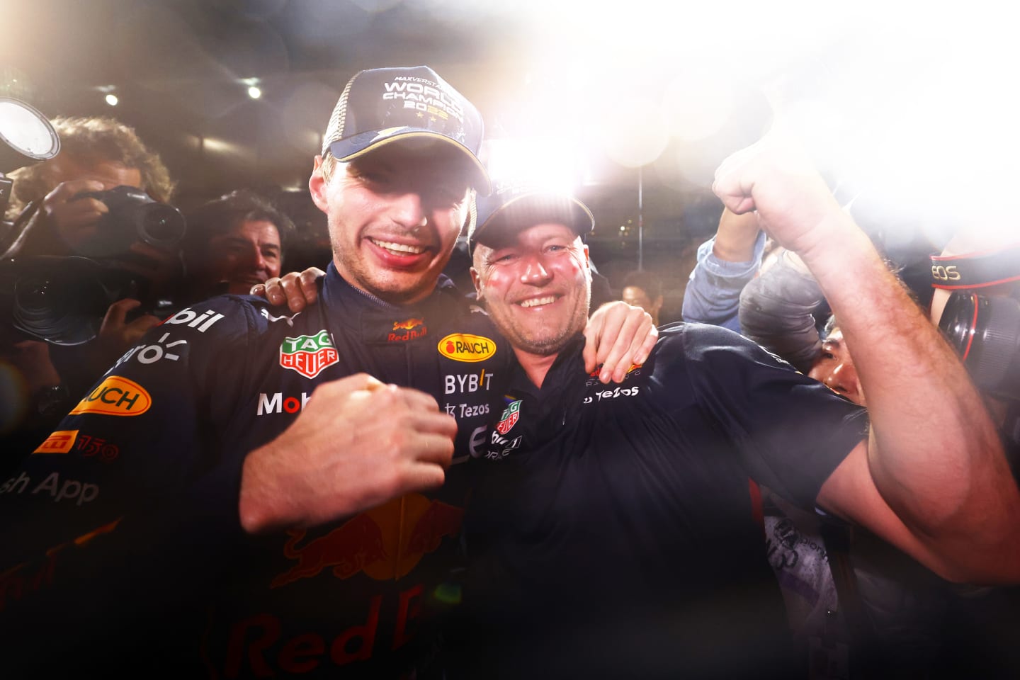 SUZUKA, JAPAN - OCTOBER 09: Race winner and 2022 F1 World Drivers Champion Max Verstappen of Netherlands and Oracle Red Bull Racing celebrates with his team after the F1 Grand Prix of Japan at Suzuka International Racing Course on October 09, 2022 in Suzuka, Japan. (Photo by Mark Thompson/Getty Images )