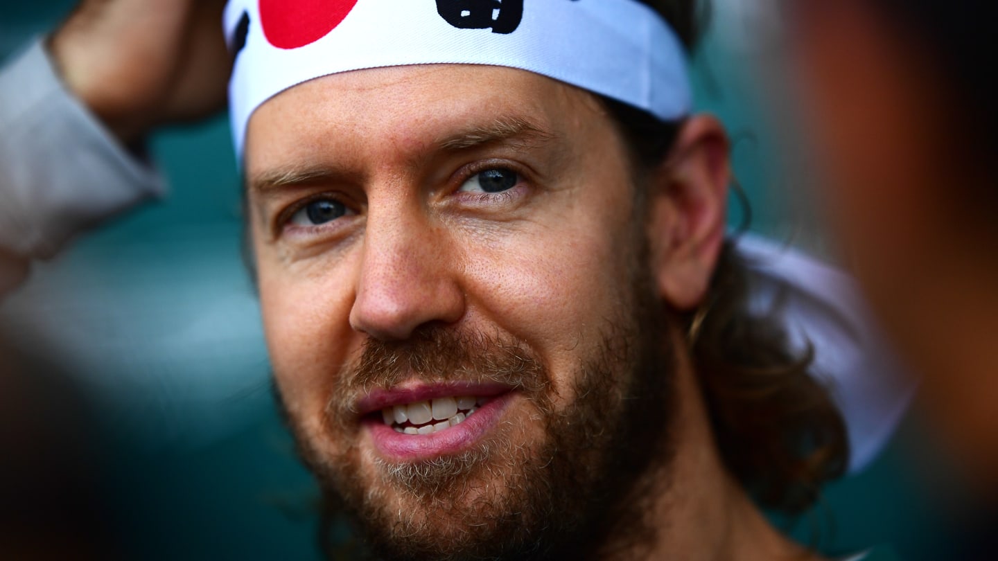 SUZUKA, JAPAN - OCTOBER 06: Sebastian Vettel of Germany and Aston Martin F1 Team talks to the media