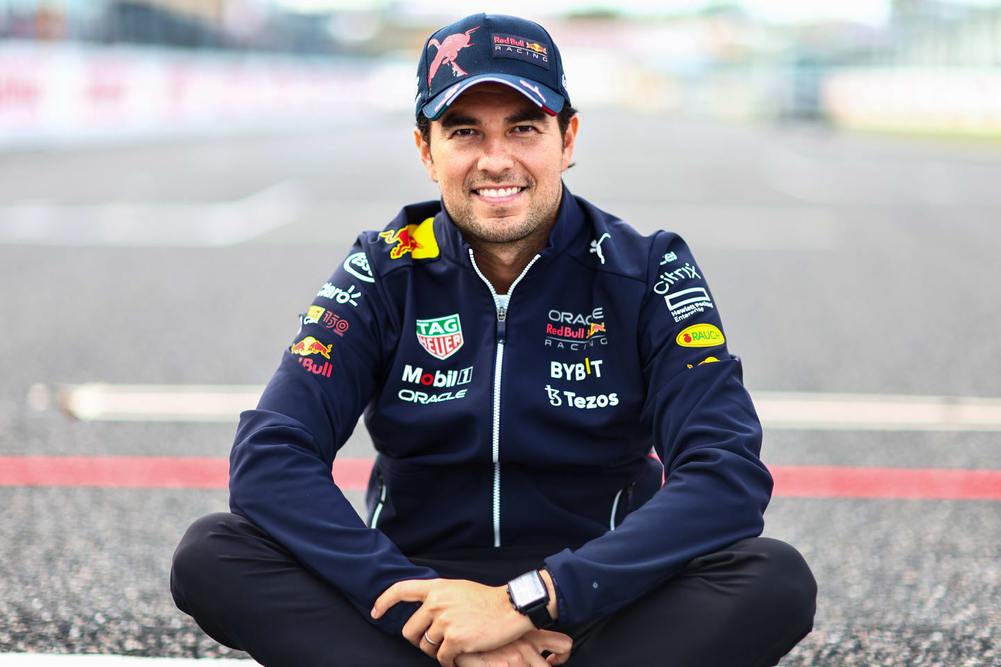 SUZUKA, JAPAN - OCTOBER 06: Sergio Perez of Mexico and Oracle Red Bull Racing poses for a photo