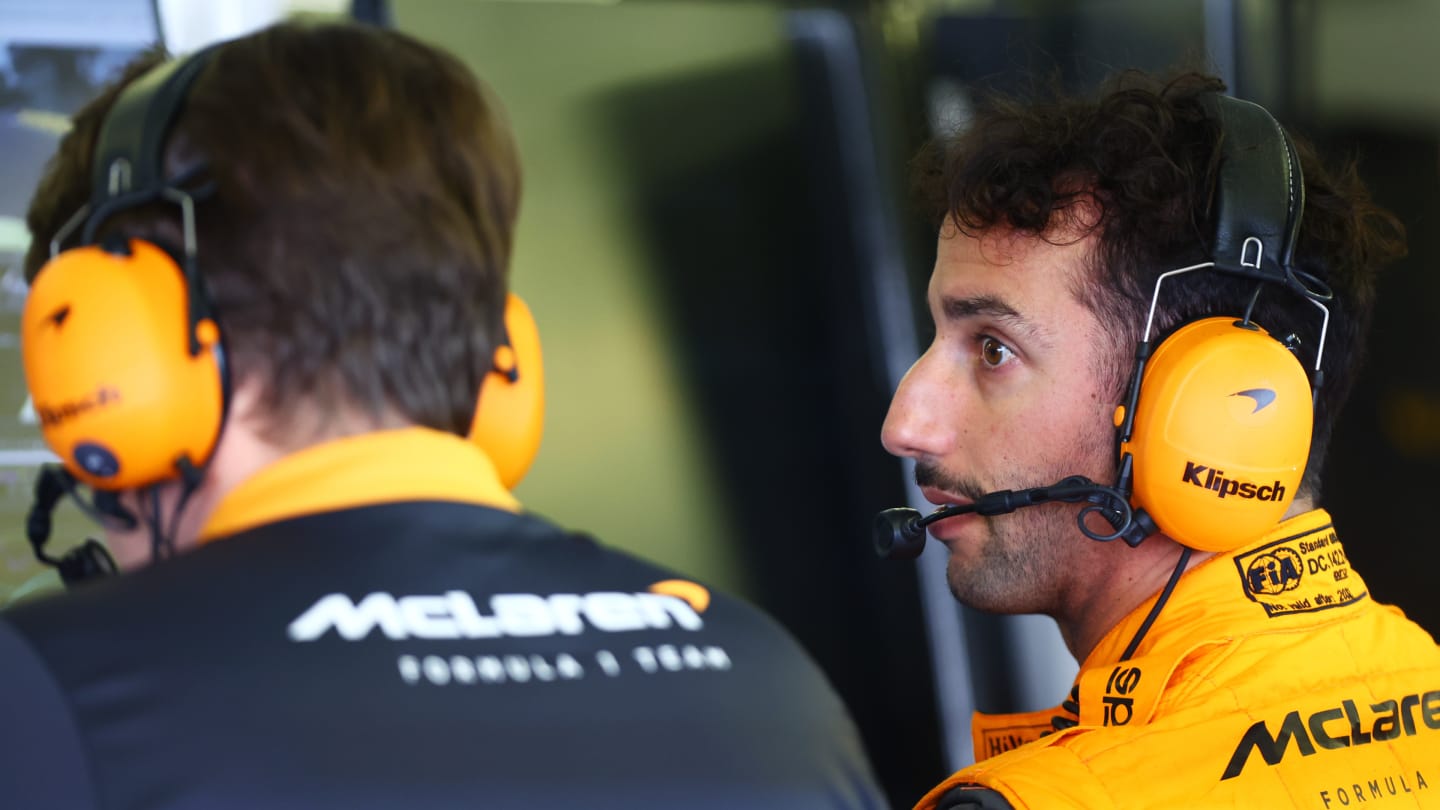 MEXICO CITY, MEXICO - OCTOBER 28: Daniel Ricciardo of Australia and McLaren talks with an engineer in the garage during practice ahead of the F1 Grand Prix of Mexico at Autodromo Hermanos Rodriguez on October 28, 2022 in Mexico City, Mexico. (Photo by Dan Istitene - Formula 1/Formula 1 via Getty Images)
