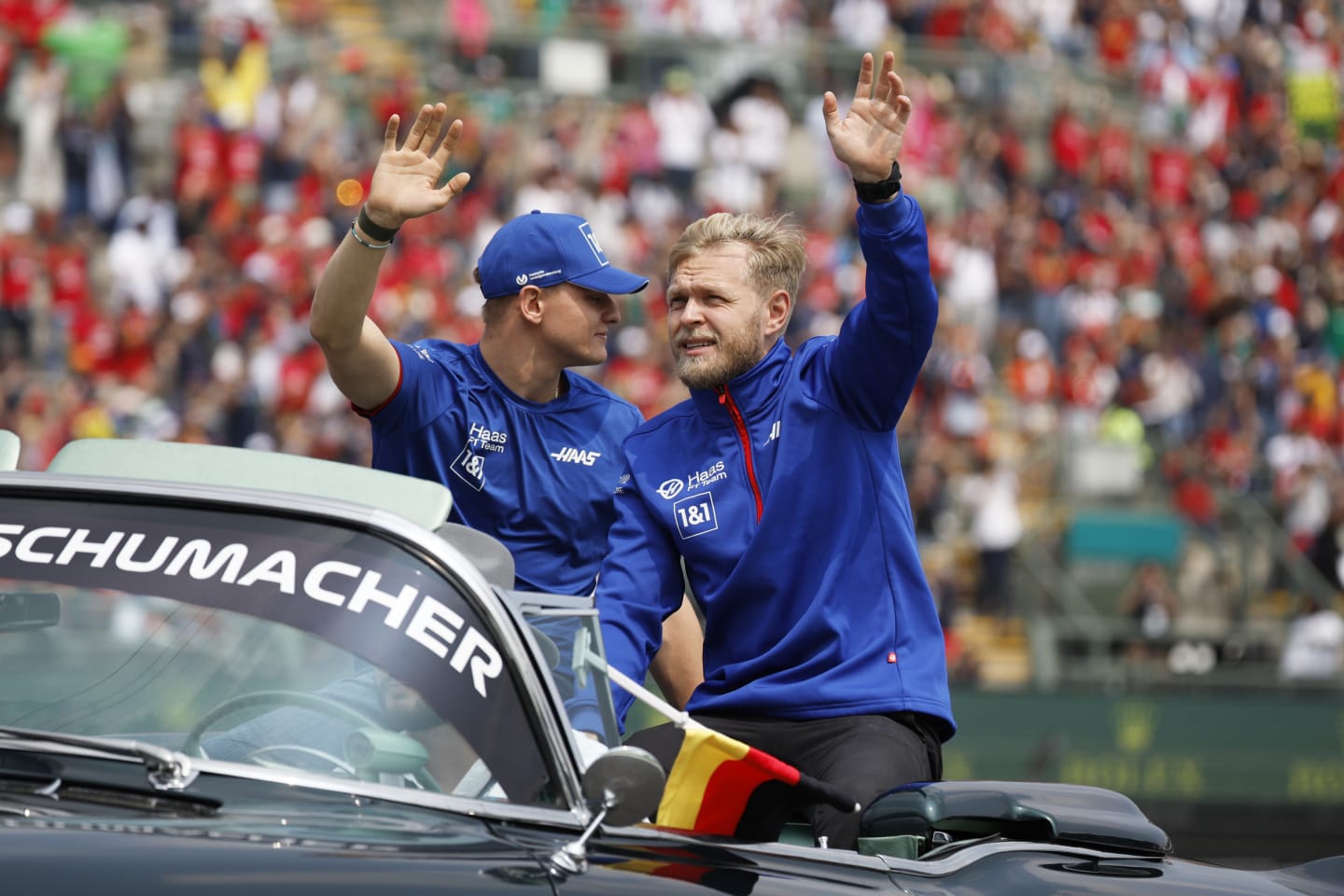 MEXICO CITY, MEXICO - OCTOBER 30: Kevin Magnussen of Denmark and Haas F1 and Mick Schumacher of