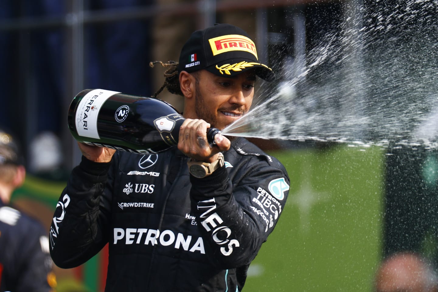 MEXICO CITY, MEXICO - OCTOBER 30: Second placed Lewis Hamilton of Great Britain and Mercedes celebrates on the podium during the F1 Grand Prix of Mexico at Autodromo Hermanos Rodriguez on October 30, 2022 in Mexico City, Mexico. (Photo by Chris Graythen/Getty Images)
