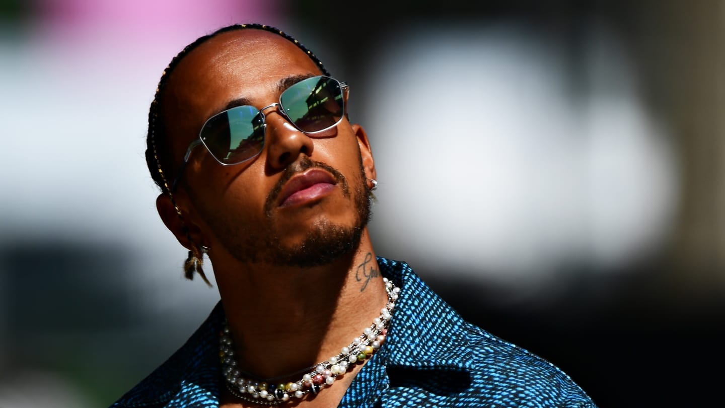 MIAMI, FLORIDA - MAY 06: Lewis Hamilton of Great Britain and Mercedes walks in the Paddock prior to