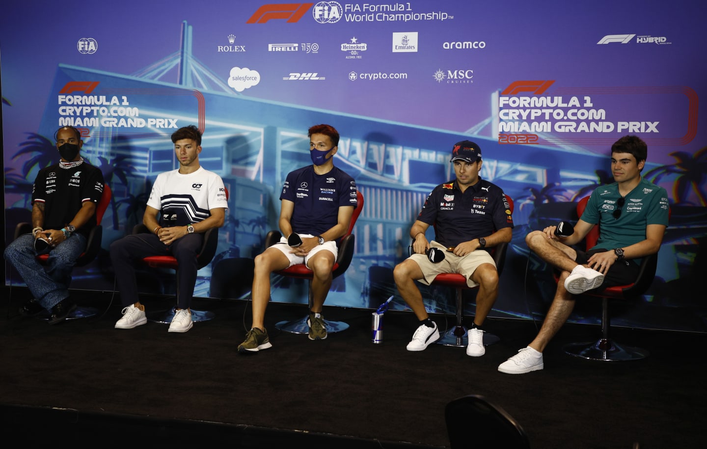 MIAMI, FLORIDA - MAY 06: (L-R) Lewis Hamilton of Great Britain and Mercedes, Pierre Gasly of France and Scuderia AlphaTauri, Alexander Albon of Thailand and Williams, Sergio Perez of Mexico and Oracle Red Bull Racing and Lance Stroll of Canada and Aston Martin F1 Team attend the Drivers Press Conference prior to practice ahead of the F1 Grand Prix of Miami at the Miami International Autodrome on May 06, 2022 in Miami, Florida. (Photo by Jared C. Tilton/Getty Images)