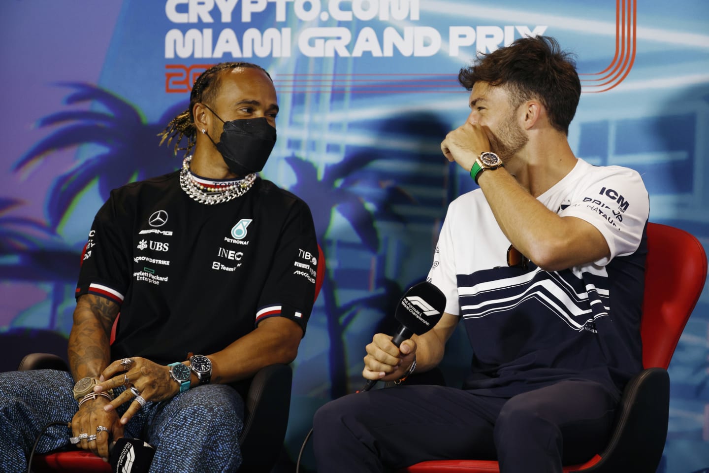 MIAMI, FLORIDA - MAY 06: Lewis Hamilton of Great Britain and Mercedes and Pierre Gasly of France and Scuderia AlphaTauri talk in the Drivers Press Conference prior to practice ahead of the F1 Grand Prix of Miami at the Miami International Autodrome on May 06, 2022 in Miami, Florida. (Photo by Jared C. Tilton/Getty Images)