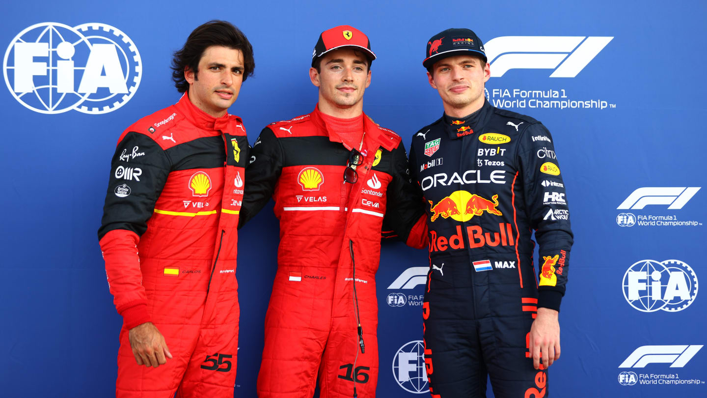 MIAMI, FLORIDA - MAY 07: Pole position qualifier Charles Leclerc of Monaco and Ferrari (C), Second placed qualifier Carlos Sainz of Spain and Ferrari (L) and Third placed qualifier Max Verstappen of the Netherlands and Oracle Red Bull Racing (R) pose for a photo in parc ferme during qualifying ahead of the F1 Grand Prix of Miami at the Miami International Autodrome on May 07, 2022 in Miami, Florida. (Photo by Dan Istitene - Formula 1/Formula 1 via Getty Images)