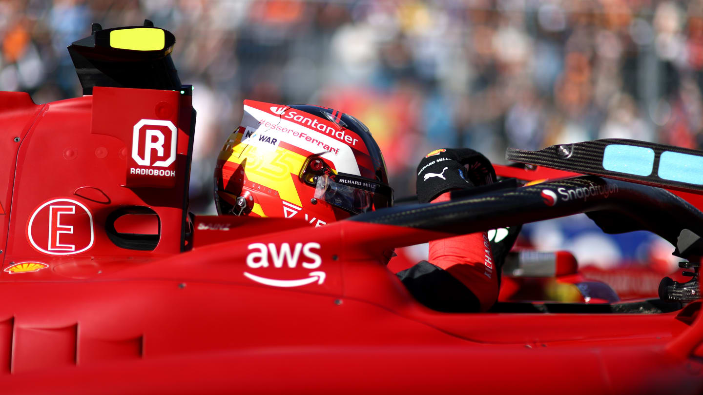 MIAMI, FLORIDA - MAY 07: Second placed qualifier Carlos Sainz of Spain and Ferrari climbs from his car in parc ferme during qualifying ahead of the F1 Grand Prix of Miami at the Miami International Autodrome on May 07, 2022 in Miami, Florida. (Photo by Dan Istitene - Formula 1/Formula 1 via Getty Images)