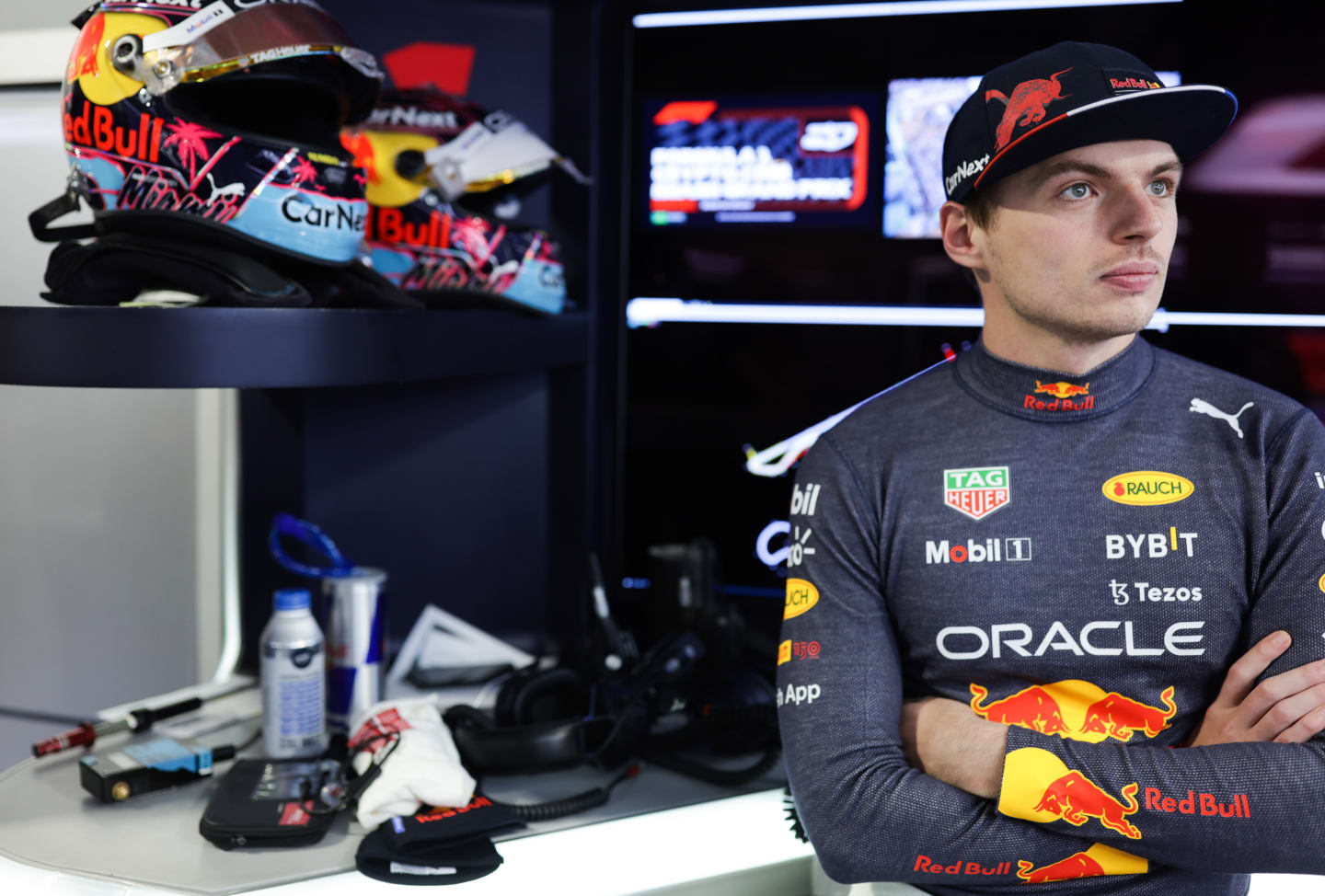 MIAMI, FLORIDA - MAY 07: Max Verstappen of the Netherlands and Oracle Red Bull Racing looks on in the garage during qualifying ahead of the F1 Grand Prix of Miami at the Miami International Autodrome on May 07, 2022 in Miami, Florida. (Photo by Mark Thompson/Getty Images)