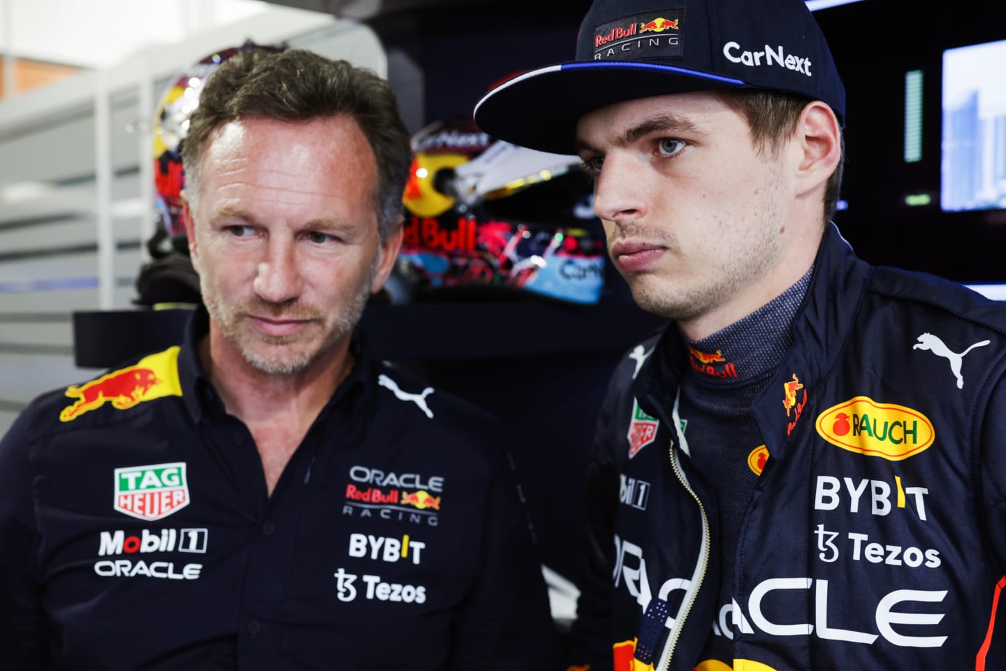 MIAMI, FLORIDA - MAY 07: Max Verstappen of the Netherlands and Oracle Red Bull Racing talks with Red Bull Racing Team Principal Christian Horner in the garage during qualifying ahead of the F1 Grand Prix of Miami at the Miami International Autodrome on May 07, 2022 in Miami, Florida. (Photo by Mark Thompson/Getty Images)
