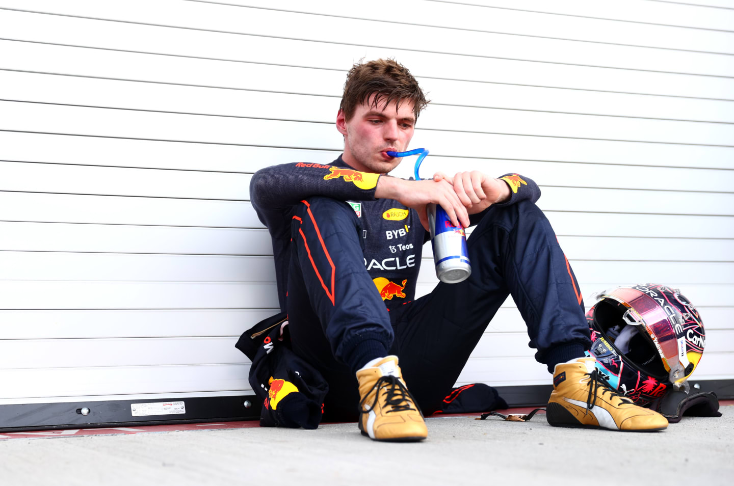 MIAMI, FLORIDA - MAY 08: Race winner Max Verstappen of the Netherlands and Oracle Red Bull Racing takes a drink in parc ferme during the F1 Grand Prix of Miami at the Miami International Autodrome on May 08, 2022 in Miami, Florida. (Photo by Dan Istitene - Formula 1/Formula 1 via Getty Images)