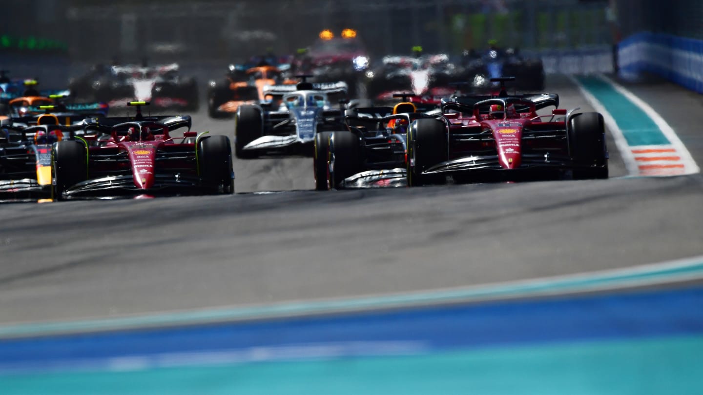 MIAMI, FLORIDA - MAY 08: Charles Leclerc of Monaco driving (16) the Ferrari F1-75 leads the field