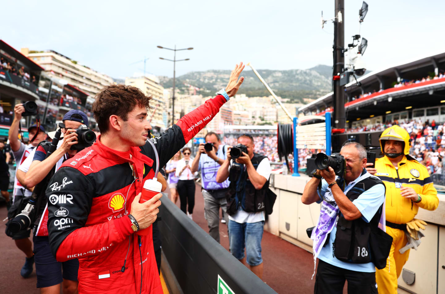 MONTE-CARLO, MONACO - MAY 28: Pole position qualifier Charles Leclerc of Monaco and Ferrari waves