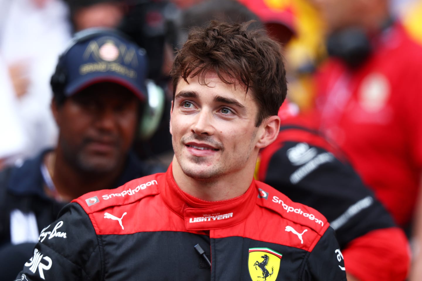 MONTE-CARLO, MONACO - MAY 28: Pole position qualifier Charles Leclerc of Monaco and Ferrari smiles in parc ferme during qualifying ahead of the F1 Grand Prix of Monaco at Circuit de Monaco on May 28, 2022 in Monte-Carlo, Monaco. (Photo by Clive Rose/Getty Images)