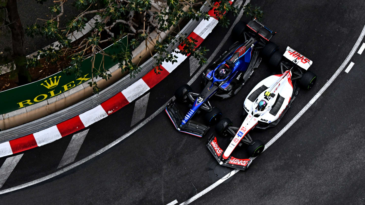 MONTE-CARLO, MONACO - MAY 29: Alexander Albon of Thailand driving the (23) Williams FW44 Mercedes and Mick Schumacher of Germany driving the (47) Haas F1 VF-22 Ferrari battle for track position during the F1 Grand Prix of Monaco at Circuit de Monaco on May 29, 2022 in Monte-Carlo, Monaco. (Photo by Clive Mason - Formula 1/Formula 1 via Getty Images)