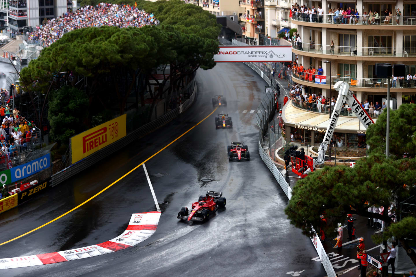 MONTE-CARLO, MONACO - MAY 29: Charles Leclerc of Monaco driving the (16) Ferrari F1-75 leads Carlos
