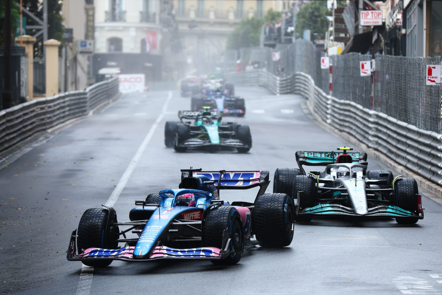 MONTE-CARLO, MONACO - MAY 29: Fernando Alonso of Spain driving the (14) Alpine F1 A522 Renault leads Lewis Hamilton of Great Britain driving the (44) Mercedes AMG Petronas F1 Team W13 during the F1 Grand Prix of Monaco at Circuit de Monaco on May 29, 2022 in Monte-Carlo, Monaco. (Photo by Clive Rose/Getty Images)