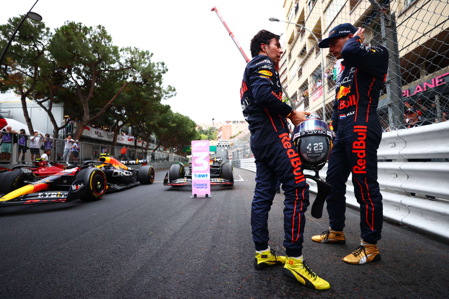 MONTE-CARLO, MONACO - MAY 29: Race winner Sergio Perez of Mexico and Oracle Red Bull Racing and Third placed Max Verstappen of the Netherlands and Oracle Red Bull Racing talk in parc ferme during the F1 Grand Prix of Monaco at Circuit de Monaco on May 29, 2022 in Monte-Carlo, Monaco. (Photo by Dan Istitene - Formula 1/Formula 1 via Getty Images)