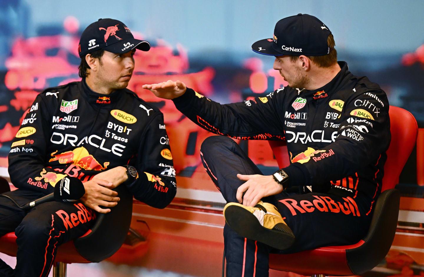 MONTE-CARLO, MONACO - MAY 29: Race winner Sergio Perez of Mexico and Oracle Red Bull Racing and Third placed Max Verstappen of the Netherlands and Oracle Red Bull Racing talk in the press conference after the F1 Grand Prix of Monaco at Circuit de Monaco on May 29, 2022 in Monte-Carlo, Monaco. (Photo by Clive Mason/Getty Images)
