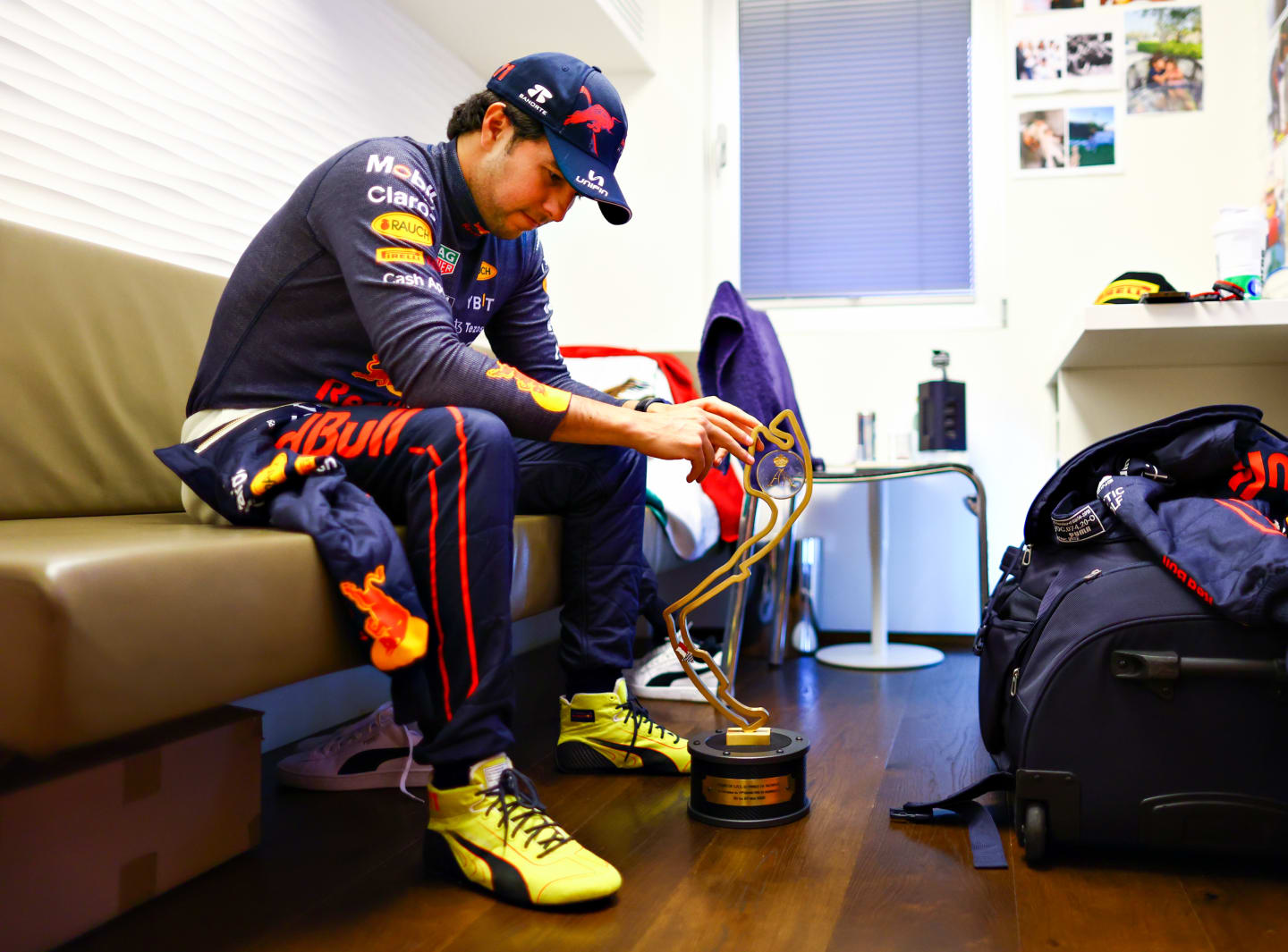 MONTE-CARLO, MONACO - MAY 29: Race winner Sergio Perez of Mexico and Oracle Red Bull Racing relaxes