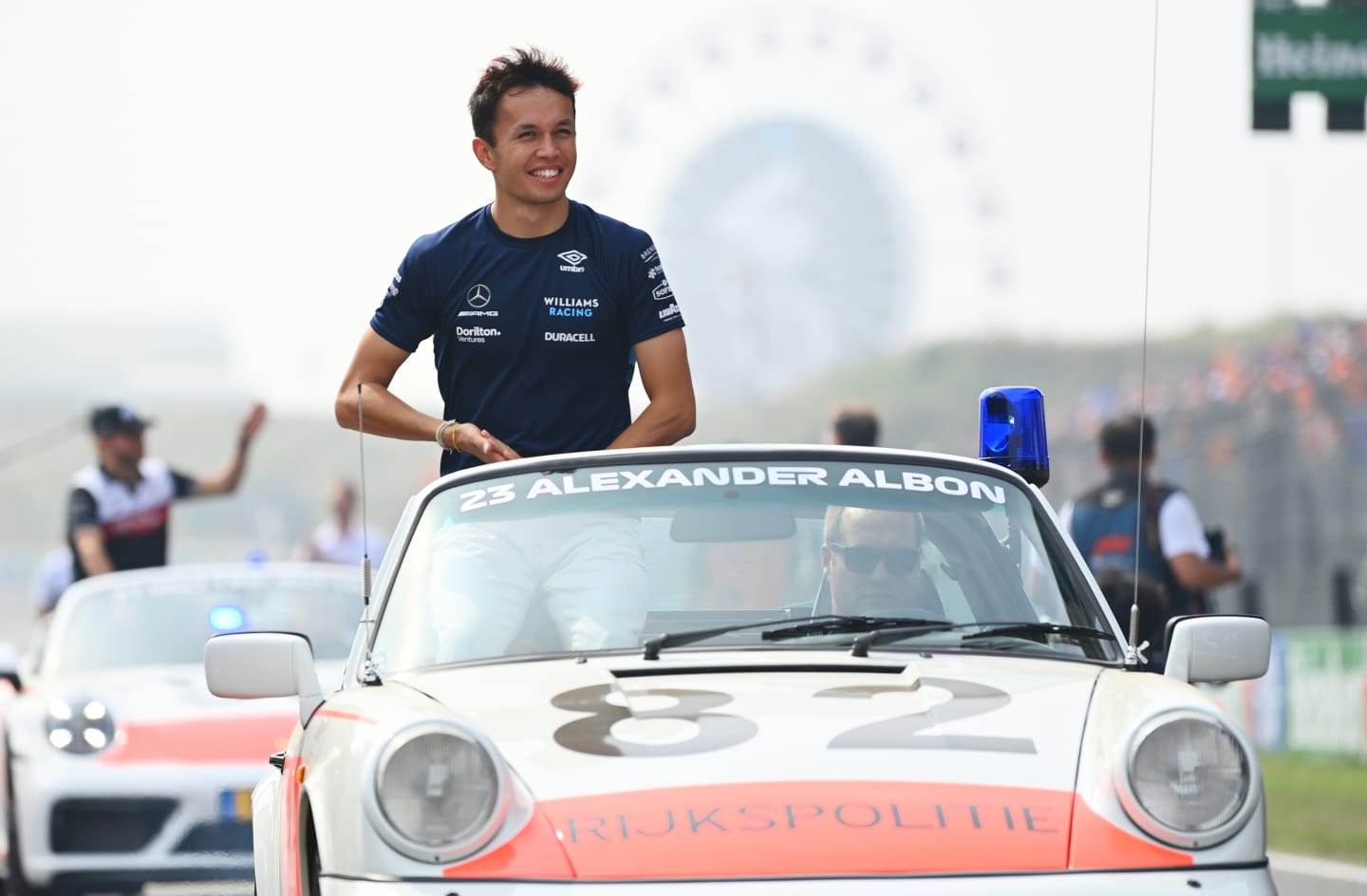 ZANDVOORT, NETHERLANDS - SEPTEMBER 04: Alexander Albon of Thailand and Williams looks on from the drivers parade prior to the F1 Grand Prix of The Netherlands at Circuit Zandvoort on September 04, 2022 in Zandvoort, Netherlands. (Photo by Dan Mullan/Getty Images)