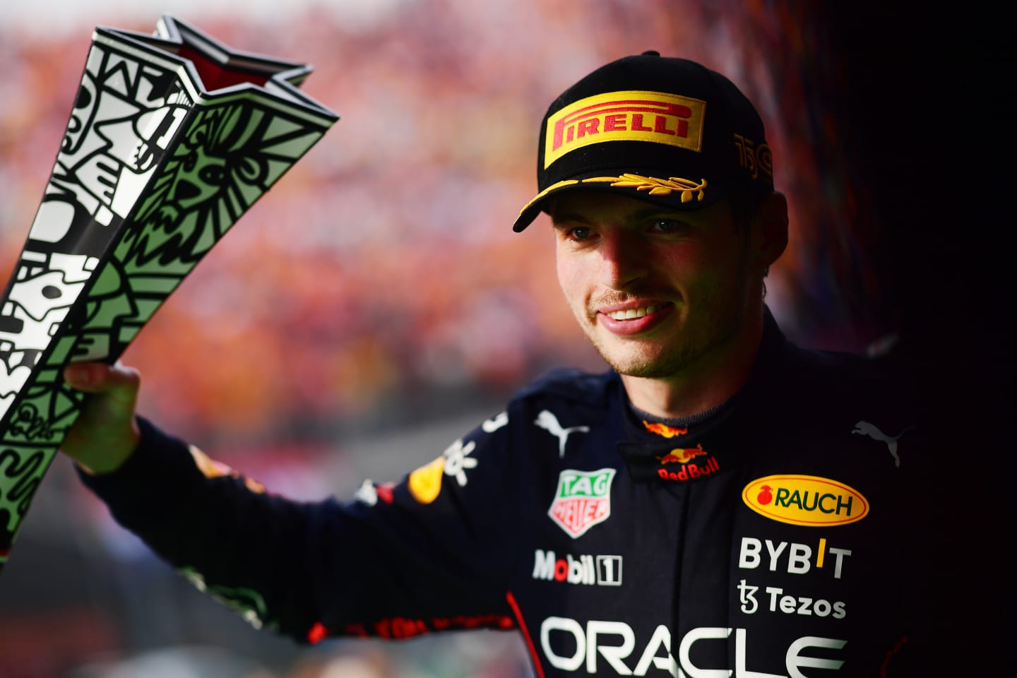 ZANDVOORT, NETHERLANDS - SEPTEMBER 04: Race winner Max Verstappen of the Netherlands and Oracle Red Bull Racing celebrates on the podium during the F1 Grand Prix of The Netherlands at Circuit Zandvoort on September 04, 2022 in Zandvoort, Netherlands. (Photo by Mario Renzi - Formula 1/Formula 1 via Getty Images)