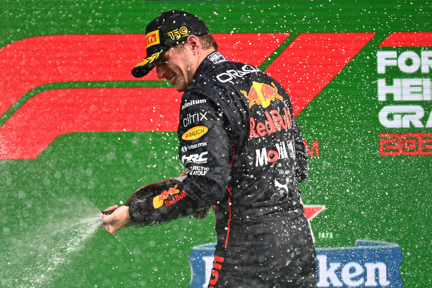 ZANDVOORT, NETHERLANDS - SEPTEMBER 04: Race winner Max Verstappen of the Netherlands and Oracle Red Bull Racing celebrates on the podium during the F1 Grand Prix of The Netherlands at Circuit Zandvoort on September 04, 2022 in Zandvoort, Netherlands. (Photo by Dan Mullan/Getty Images)