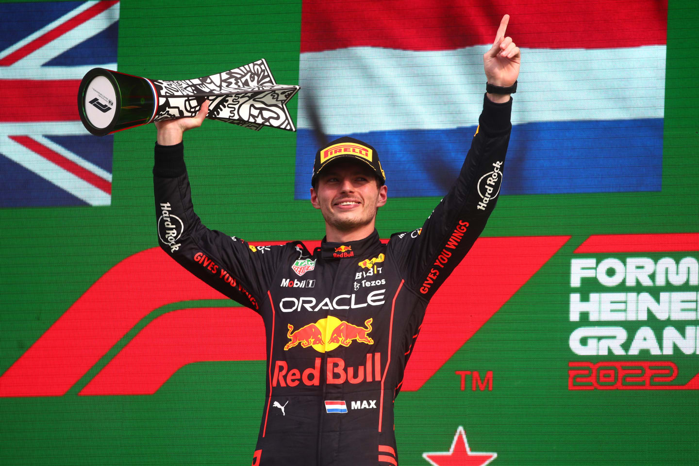 ZANDVOORT, NETHERLANDS - SEPTEMBER 04: Race winner Max Verstappen of the Netherlands and Oracle Red Bull Racing celebrates on the podium during the F1 Grand Prix of The Netherlands at Circuit Zandvoort on September 04, 2022 in Zandvoort, Netherlands. (Photo by Joe Portlock - Formula 1/Formula 1 via Getty Images)