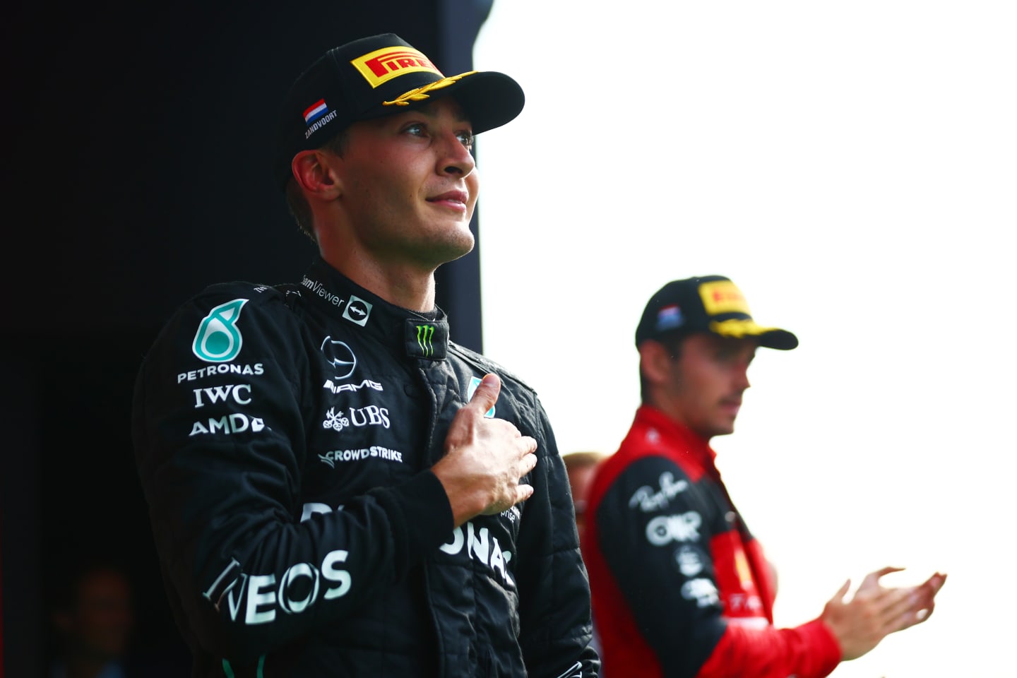 ZANDVOORT, NETHERLANDS - SEPTEMBER 04: Second placed George Russell of Great Britain and Mercedes celebrates on the podium during the F1 Grand Prix of The Netherlands at Circuit Zandvoort on September 04, 2022 in Zandvoort, Netherlands. (Photo by Dan Istitene - Formula 1/Formula 1 via Getty Images)
