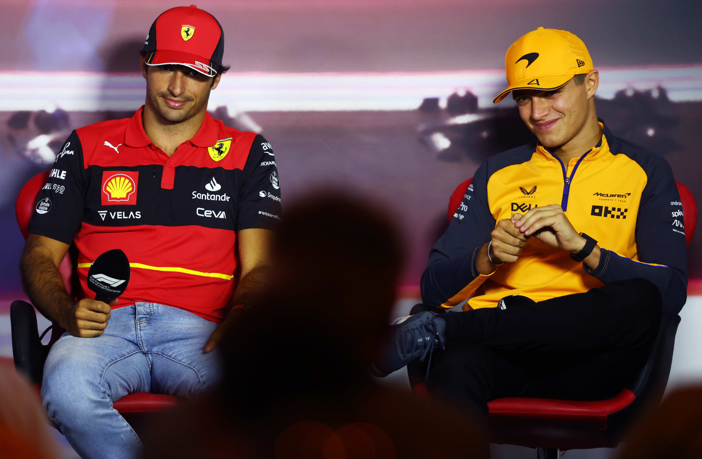 ZANDVOORT, NETHERLANDS - SEPTEMBER 01: Carlos Sainz of Spain and Ferrari and Lando Norris of Great Britain and McLaren attend the Drivers Press Conference during previews ahead of the F1 Grand Prix of The Netherlands at Circuit Zandvoort on September 01, 2022 in Zandvoort, Netherlands. (Photo by Lars Baron/Getty Images)