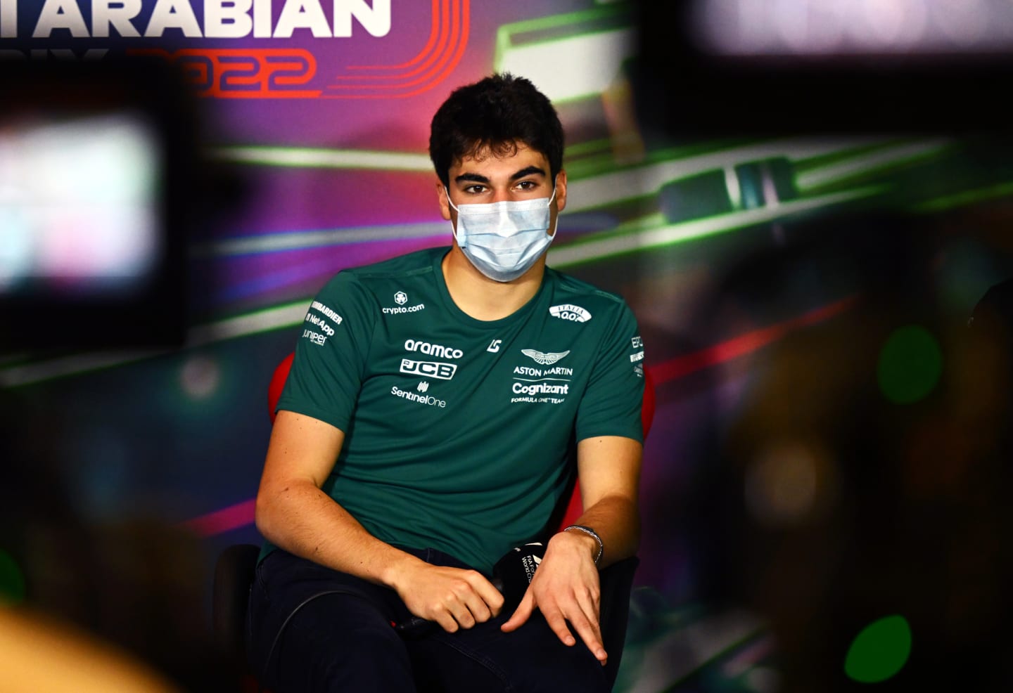 JEDDAH, SAUDI ARABIA - MARCH 25: Lance Stroll of Canada and Aston Martin F1 Team looks on in the Drivers Press Conference before practice ahead of the F1 Grand Prix of Saudi Arabia at the Jeddah Corniche Circuit on March 25, 2022 in Jeddah, Saudi Arabia. (Photo by Clive Mason/Getty Images)