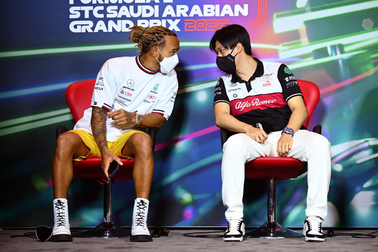 JEDDAH, SAUDI ARABIA - MARCH 25: Lewis Hamilton of Great Britain and Mercedes and Zhou Guanyu of