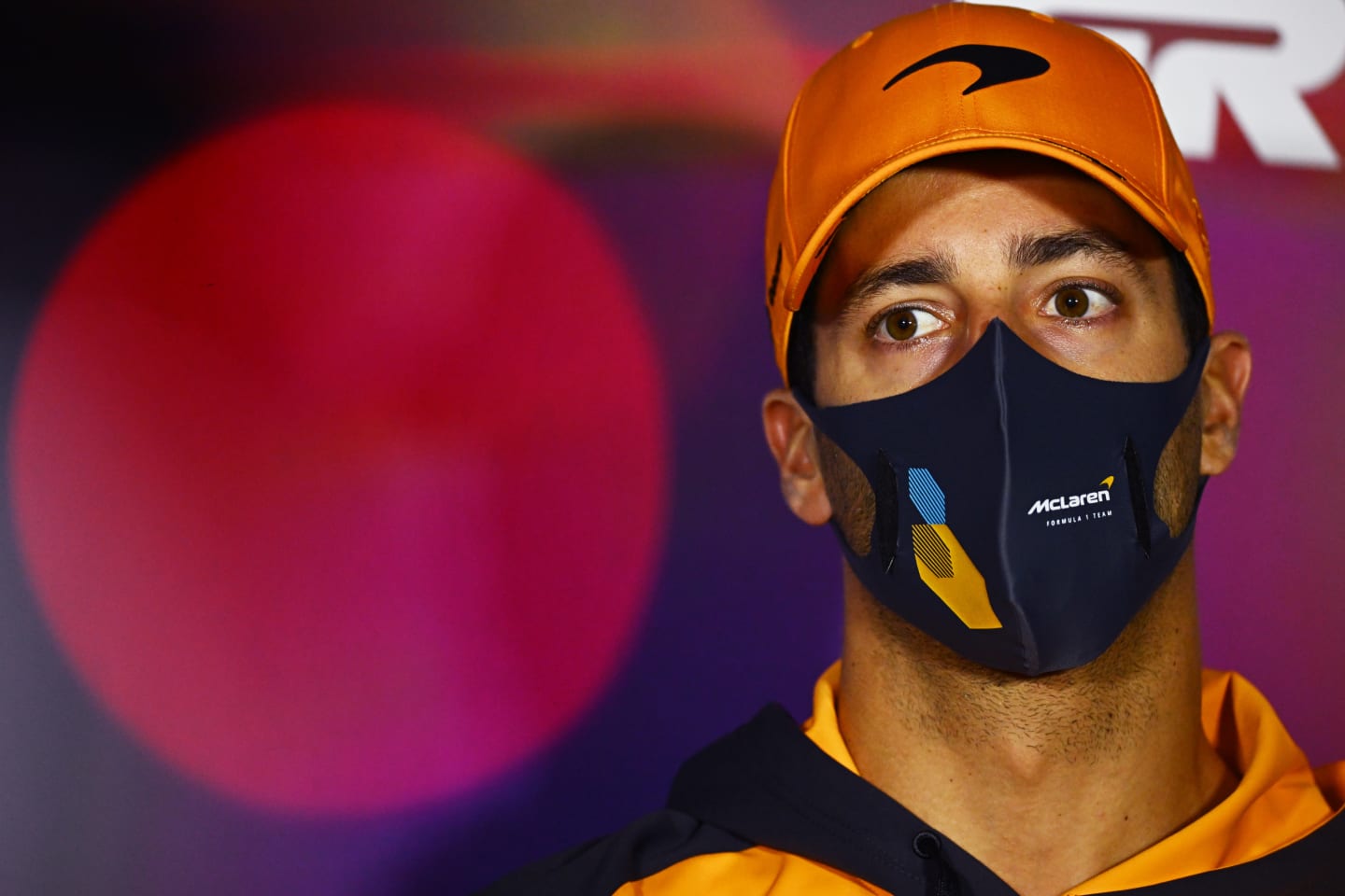 JEDDAH, SAUDI ARABIA - MARCH 25: Daniel Ricciardo of Australia and McLaren looks on in the Drivers Press Conference before practice ahead of the F1 Grand Prix of Saudi Arabia at the Jeddah Corniche Circuit on March 25, 2022 in Jeddah, Saudi Arabia. (Photo by Clive Mason/Getty Images)