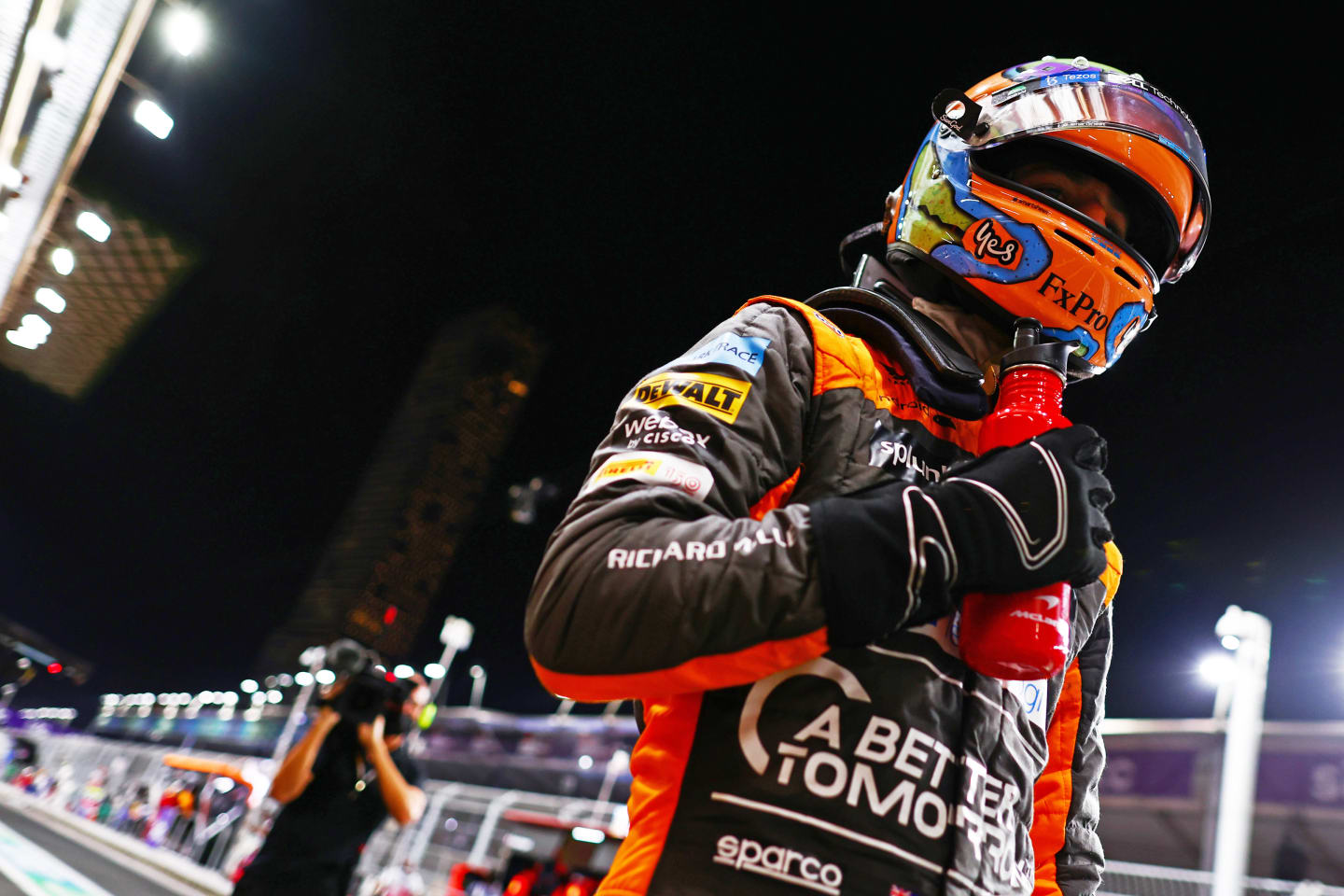 JEDDAH, SAUDI ARABIA - MARCH 26: Daniel Ricciardo of Australia and McLaren walks in the Pitlane
