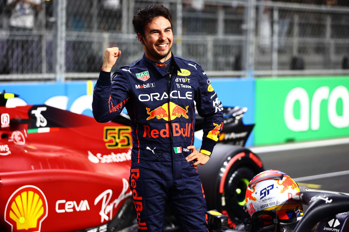 JEDDAH, SAUDI ARABIA - MARCH 26: Pole position qualifier Sergio Perez of Mexico and Oracle Red Bull Racing celebrates in parc ferme during qualifying ahead of the F1 Grand Prix of Saudi Arabia at the Jeddah Corniche Circuit on March 26, 2022 in Jeddah, Saudi Arabia. (Photo by Mark Thompson/Getty Images)