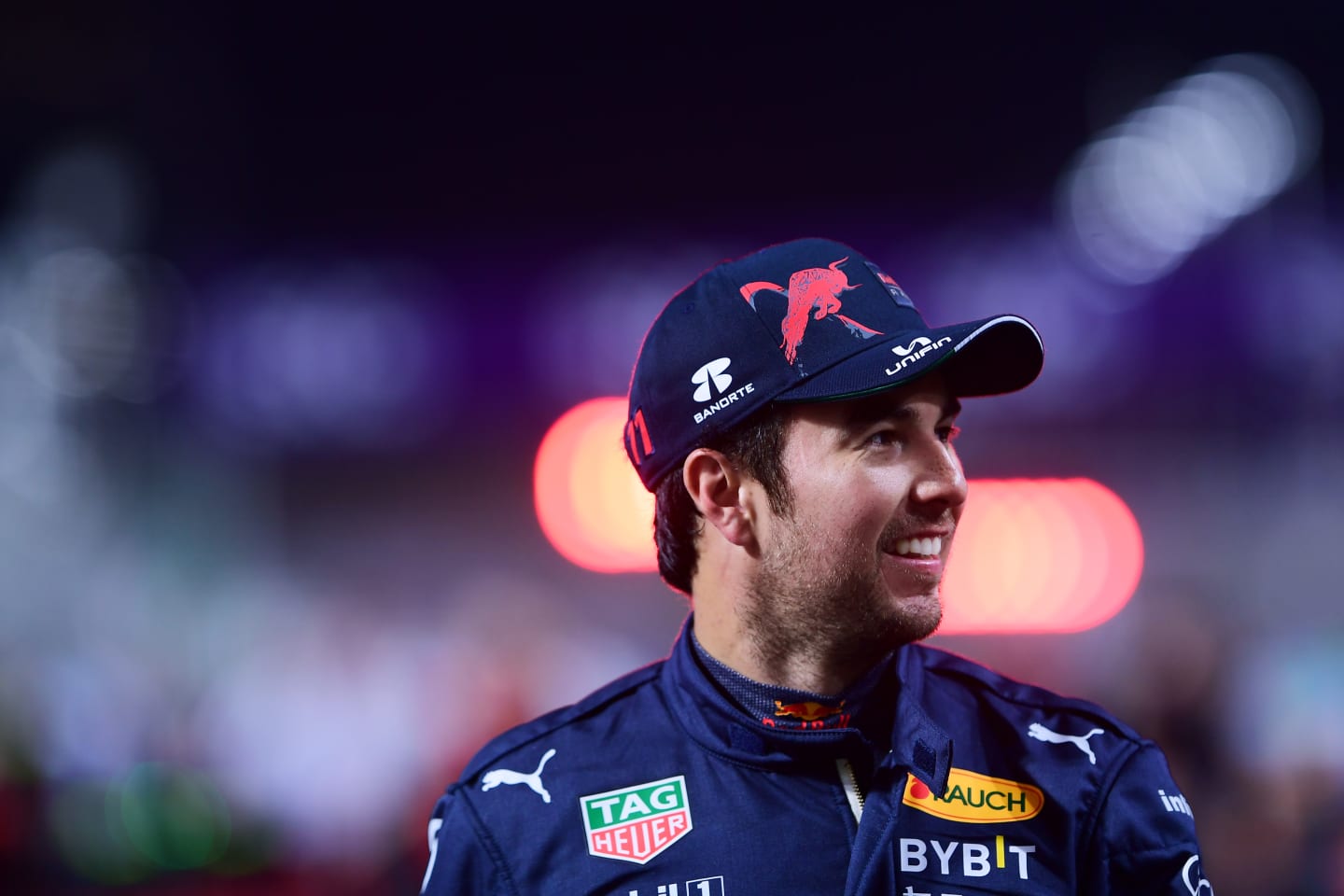 JEDDAH, SAUDI ARABIA - MARCH 26: Pole position qualifier Sergio Perez of Mexico and Oracle Red Bull Racing looks on  in parc ferme during qualifying ahead of the F1 Grand Prix of Saudi Arabia at the Jeddah Corniche Circuit on March 26, 2022 in Jeddah, Saudi Arabia. (Photo by Mario Renzi - Formula 1/Formula 1 via Getty Images)