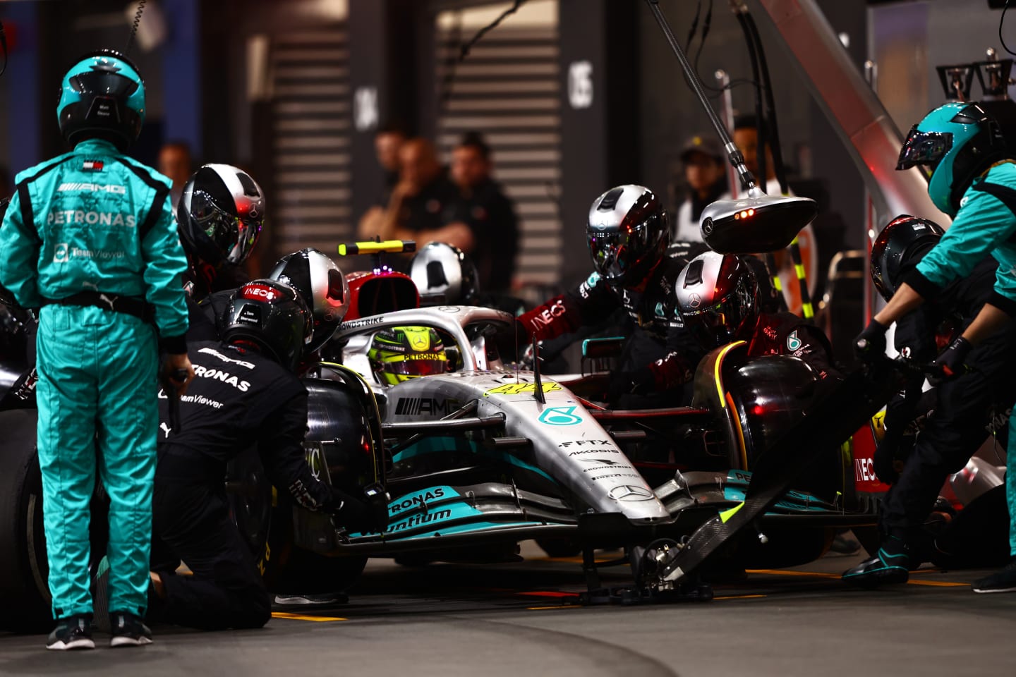 JEDDAH, SAUDI ARABIA - MARCH 27: Lewis Hamilton of Great Britain driving the (44) Mercedes AMG Petronas F1 Team W13 makes a pitstop during the F1 Grand Prix of Saudi Arabia at the Jeddah Corniche Circuit on March 27, 2022 in Jeddah, Saudi Arabia. (Photo by Mark Thompson/Getty Images)